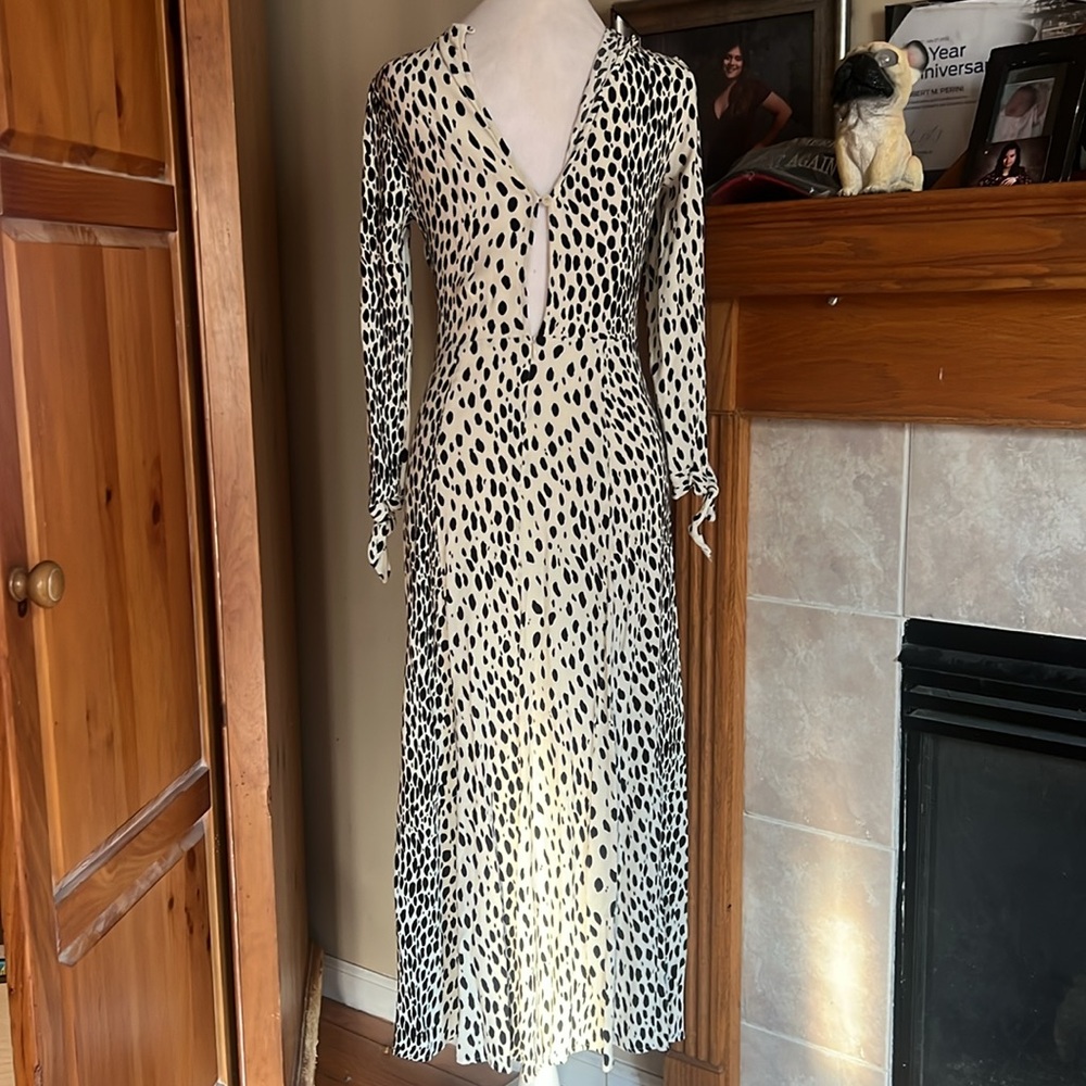 Elegant Black and White Polka Dot Dress - Picture 6 of 9